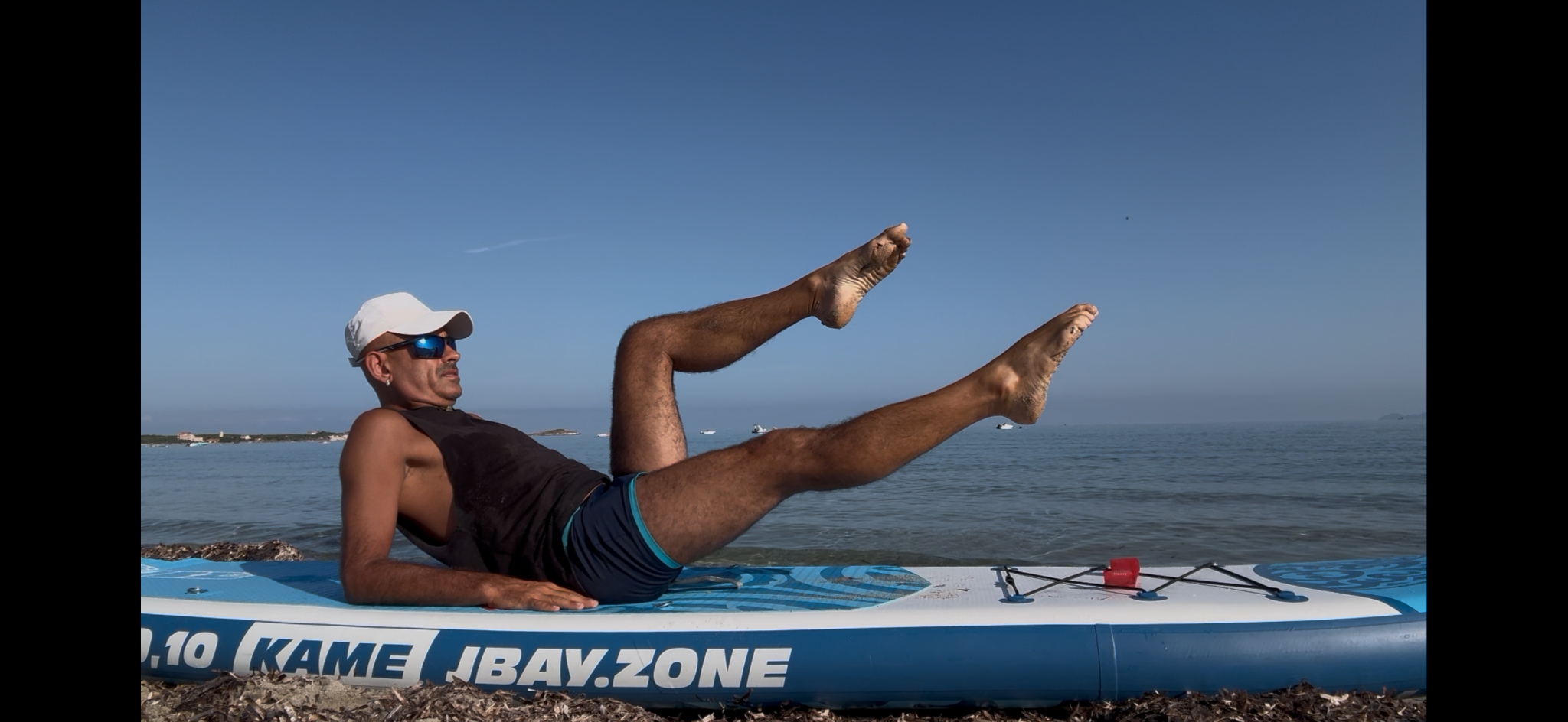 Paddleboard yoga practice with Toro